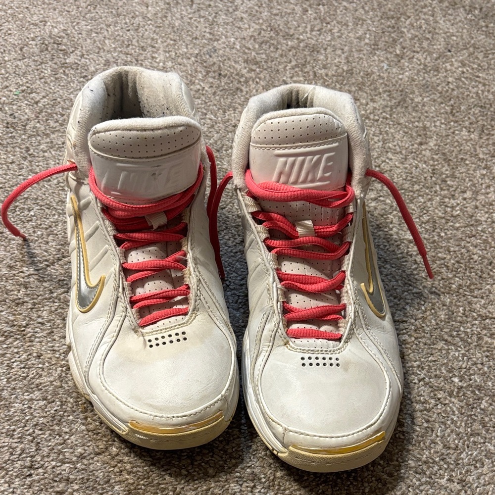 Nike White and Gold Sneakers with Red Accents
